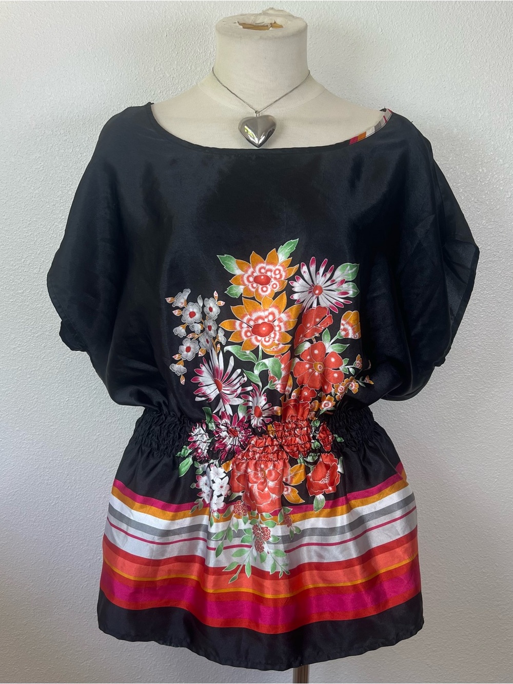 Black Floral Satin Peplum Top with Bright Stripe Hem